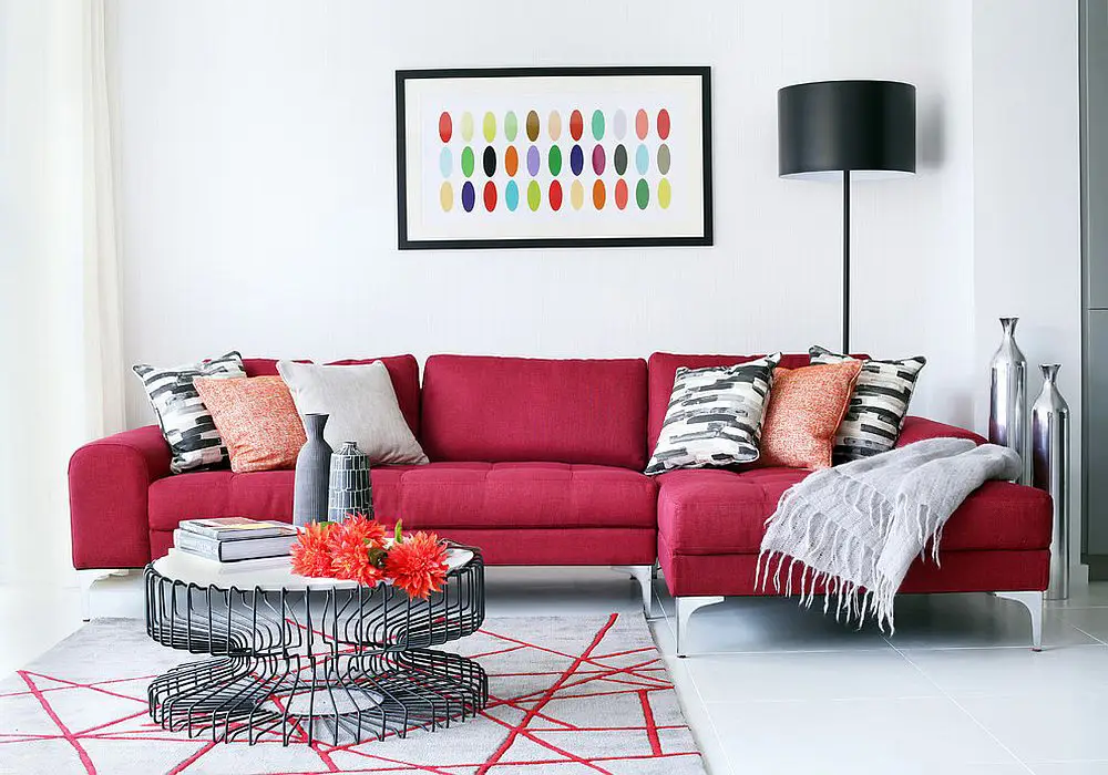 Guide to buying a sofa Exquisite dark red sofa brings vivaciousness to the white living room